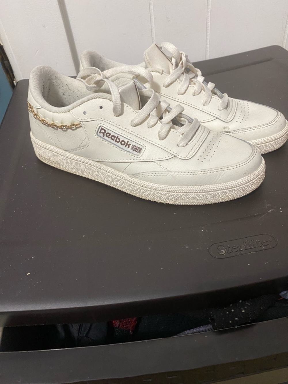 Reebok Off-White Leather Low-Top Sneakers with Gold Chain Accent